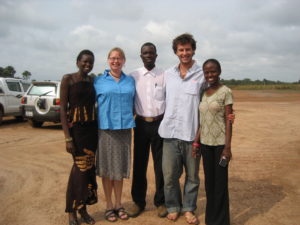 Intern Cathy and advisor Colin with staff in Yei